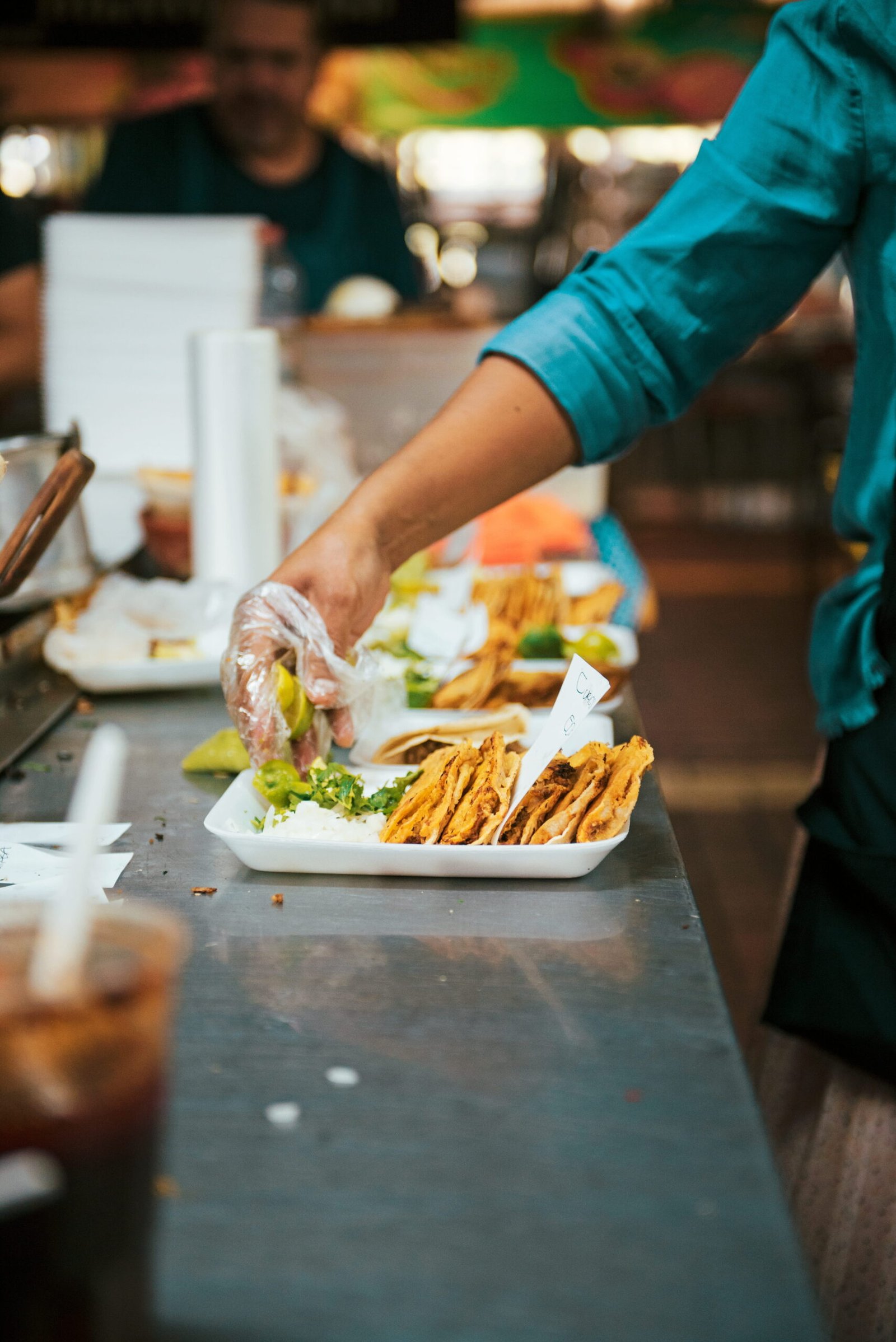 Fresh tacos prepared at an urban food stall